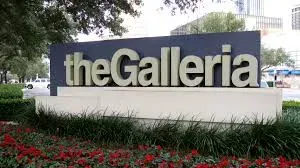 The Galleria entrance sign surrounded by landscaping