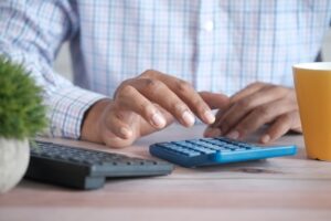 A business owner reviewing FSA limits for 2025 with a benefits consultant.
