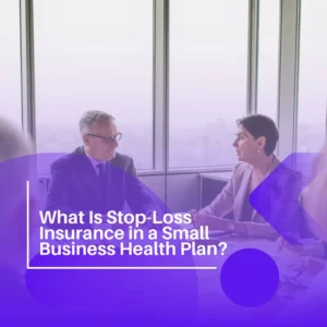 Business owners reviewing stop-loss insurance options for a small business health plan